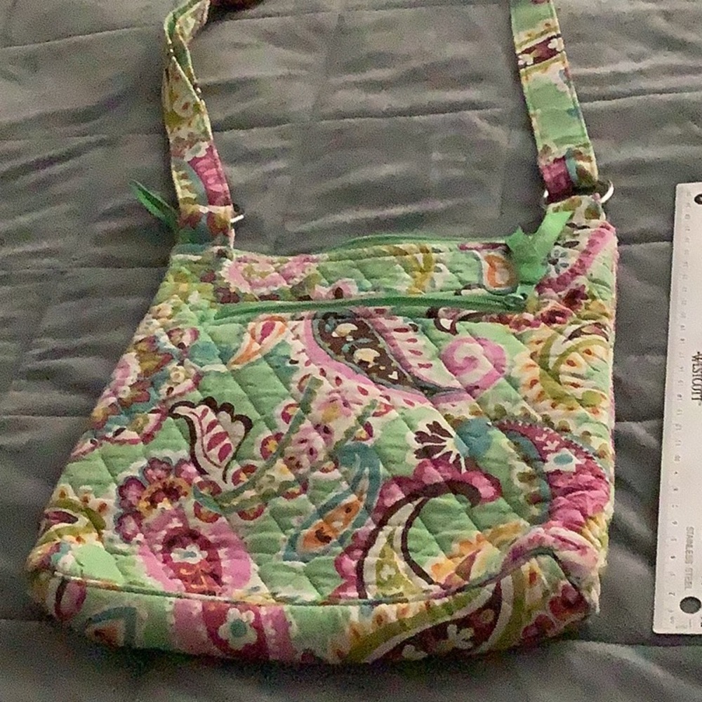 Vera Bradley Crossbody - adjustable straps with lots of storage.  Very practical